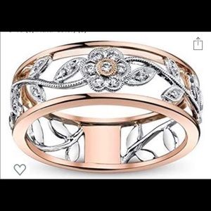 Woman’s silver and rose gold color floral band